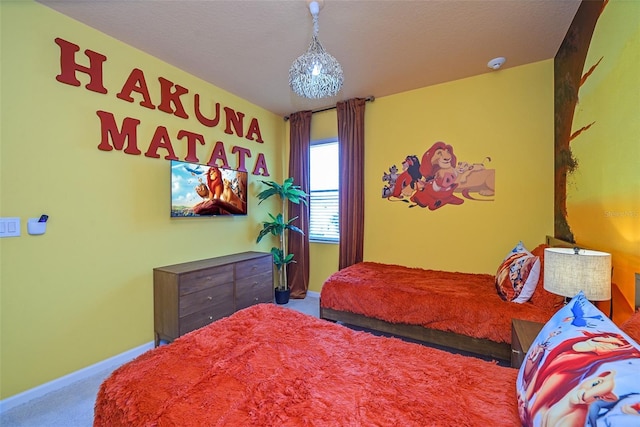 carpeted bedroom with baseboards