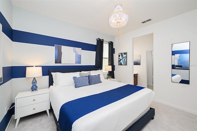 carpeted bedroom featuring visible vents, a notable chandelier, ensuite bath, and baseboards