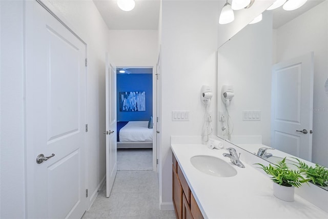 bathroom featuring vanity and ensuite bath