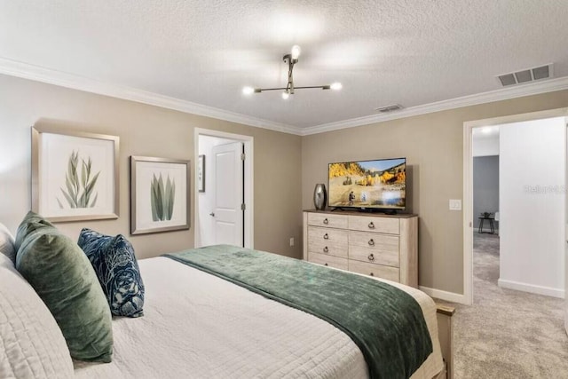 bedroom featuring a textured ceiling, carpet flooring, and crown molding