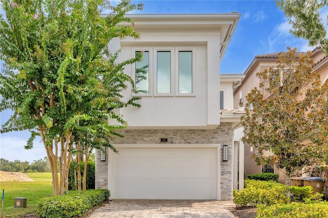 view of front of home with a garage