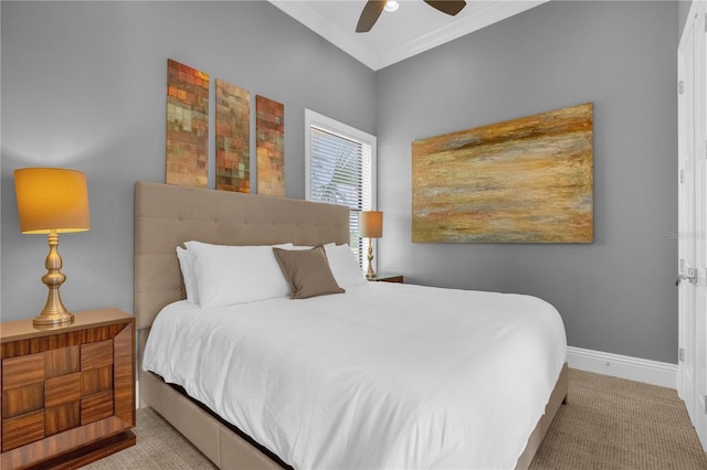 bedroom featuring ceiling fan, ornamental molding, and light carpet