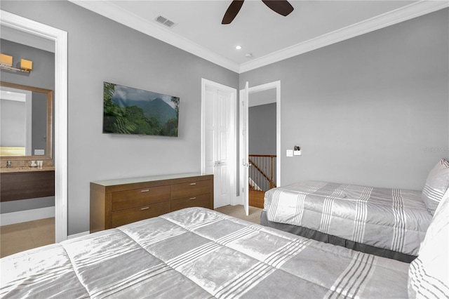 unfurnished bedroom with crown molding, ceiling fan, and ensuite bathroom