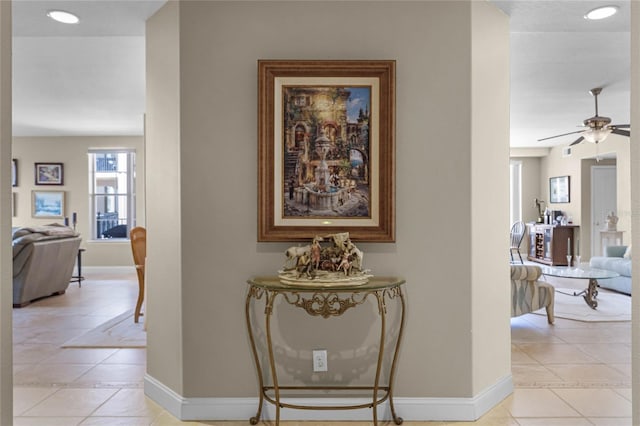 hallway with light tile patterned floors