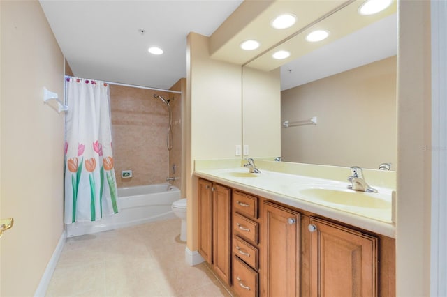 full bathroom with tile patterned floors, shower / tub combo, vanity, and toilet