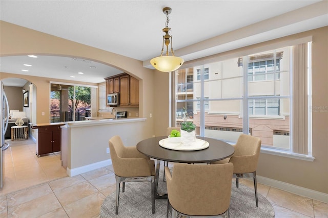 view of tiled dining space