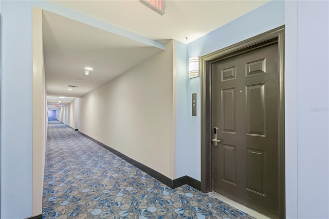 hallway with carpet