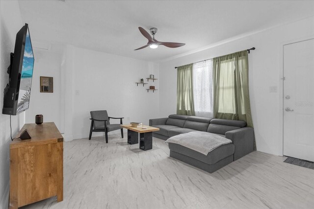 living room featuring ceiling fan