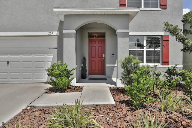 property entrance featuring a garage