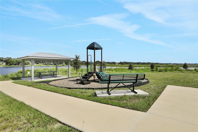 view of play area with a water view, a lawn, and a gazebo