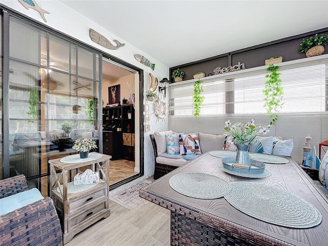 dining space with light wood-type flooring