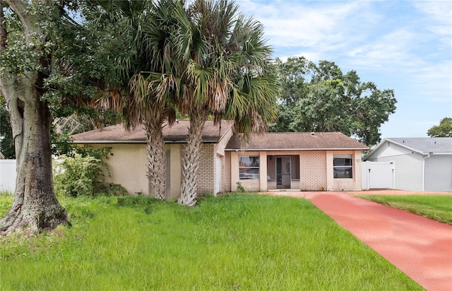 view of front of house with a front yard