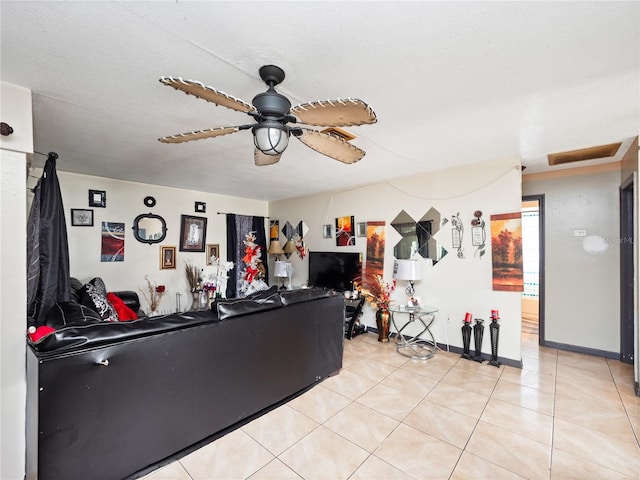 interior space featuring ceiling fan and light tile patterned floors