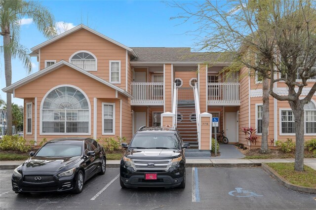 view of front of property with a balcony