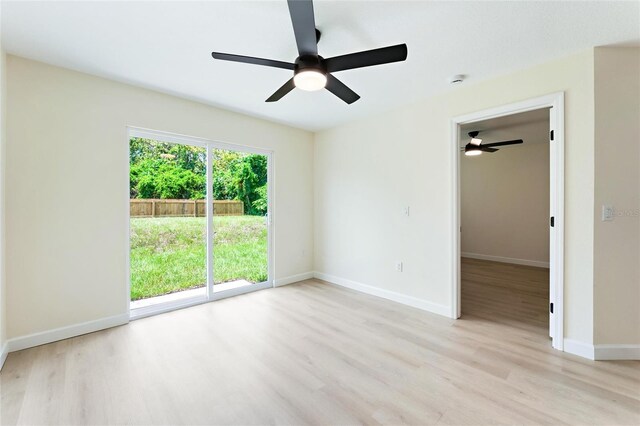 unfurnished room with ceiling fan and light hardwood / wood-style flooring