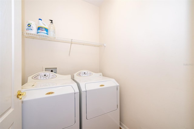 laundry room featuring independent washer and dryer