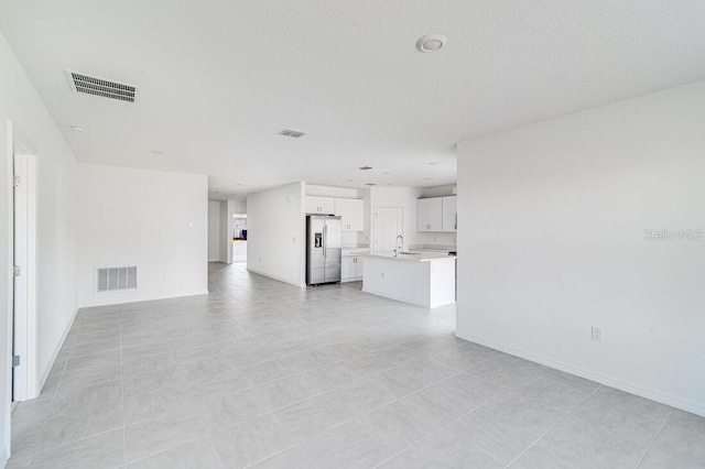 349 River Front Way, Edgewater, FL 32141 - unfurnished living room featuring sink