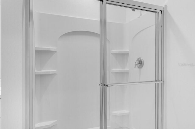 349 River Front Way, Edgewater, FL 32141 - bathroom with a shower with shower door