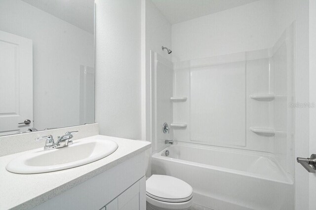 349 River Front Way, Edgewater, FL 32141 - full bathroom with washtub / shower combination, vanity, and toilet