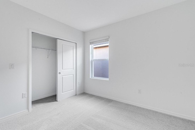349 River Front Way, Edgewater, FL 32141 - unfurnished bedroom with light carpet and a closet