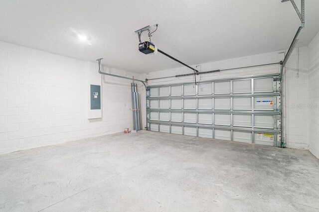 349 River Front Way, Edgewater, FL 32141 - garage with a garage door opener and electric panel