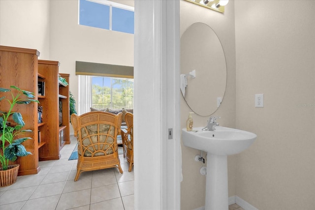 bathroom featuring sink and tile patterned flooring