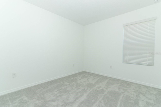 empty room with light carpet