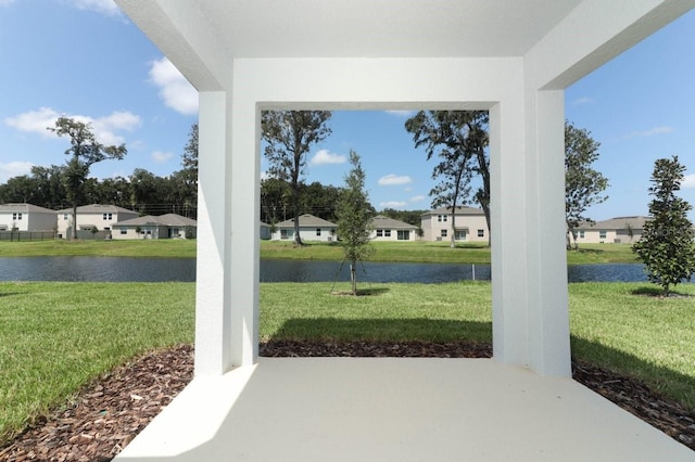 view of patio featuring a water view