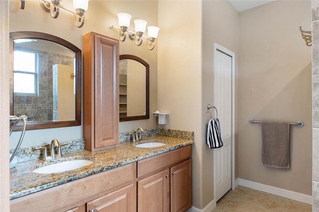 bathroom featuring dual bowl vanity and tile patterned floors