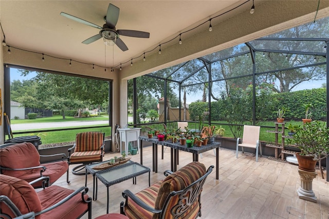 exterior space featuring ceiling fan and rail lighting