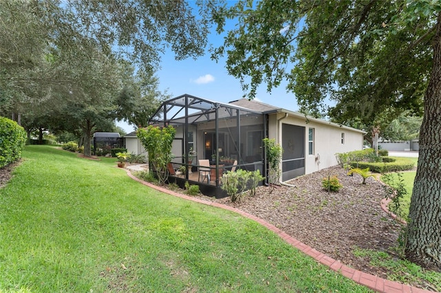 view of yard with a lanai