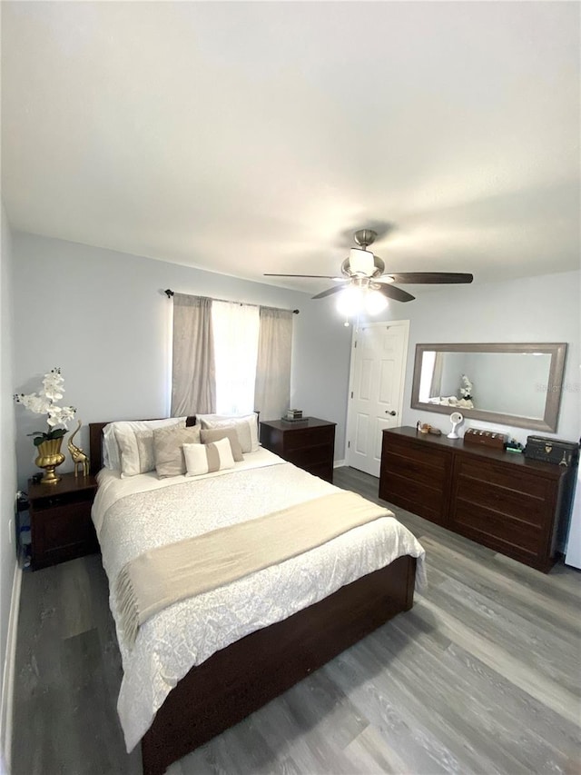 bedroom featuring ceiling fan and light hardwood / wood-style floors