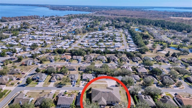 4490 Treasure Cay Rd, Tavares, FL 32778 - aerial view of property's location with a nearby body of water and nearby suburban area