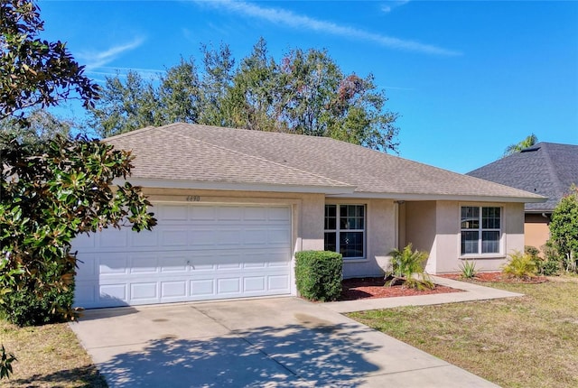 4490 Treasure Cay Rd, Tavares, FL 32778 - ranch-style house featuring stucco siding, driveway, an attached garage, a shingled roof, and a front lawn