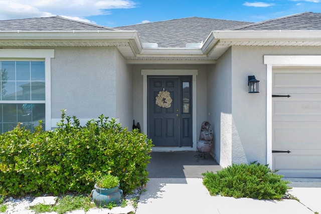 entrance to property featuring a garage