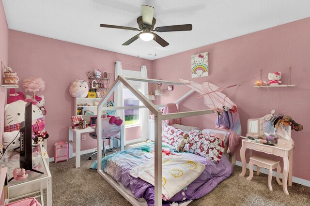 carpeted bedroom featuring ceiling fan