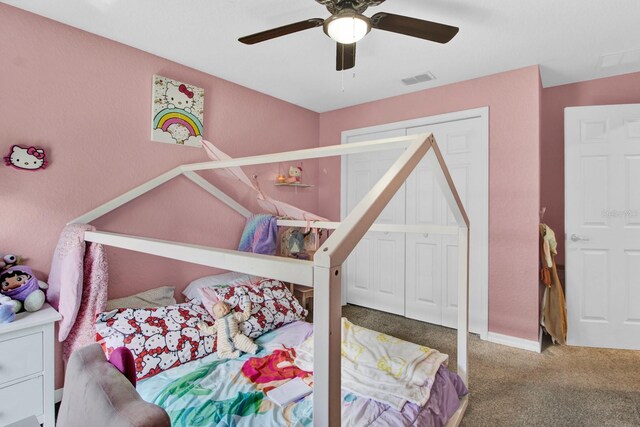 carpeted bedroom featuring ceiling fan