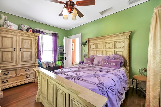 bedroom featuring ceiling fan and dark hardwood / wood-style flooring