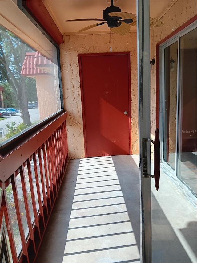 balcony featuring a ceiling fan