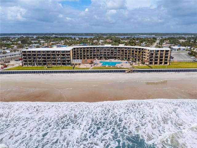 aerial view featuring a water view and a beach view