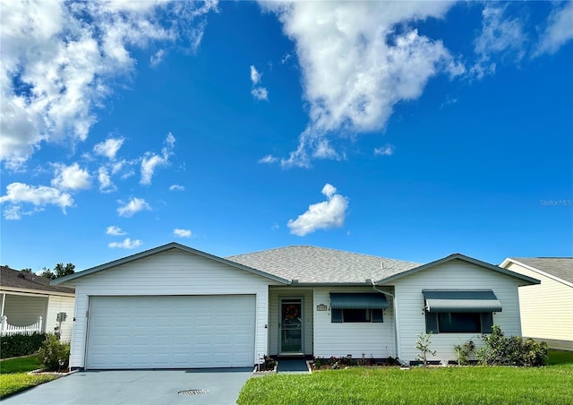 single story home featuring a garage, a front yard, concrete driveway, and a shingled roof