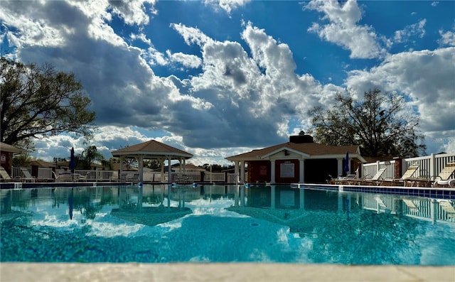 view of swimming pool with a gazebo