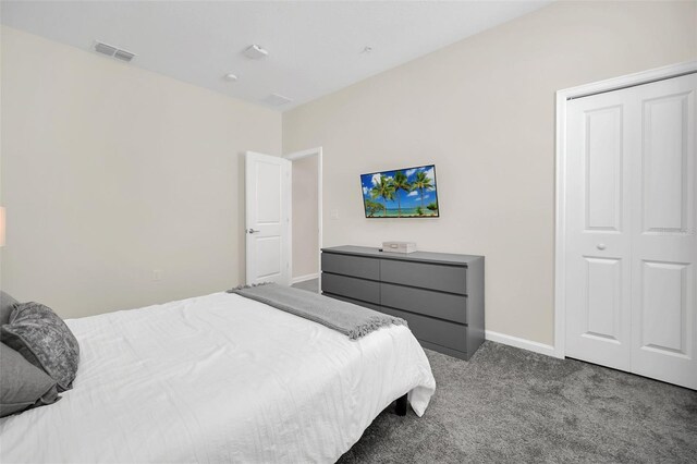 bedroom featuring a closet and carpet