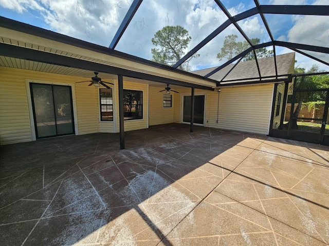 exterior space featuring a lanai, ceiling fan, and a patio area