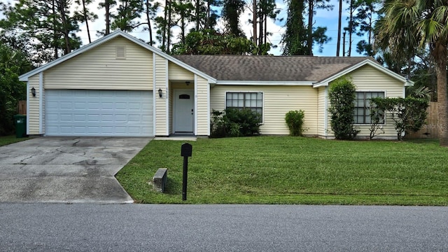 single story home with a front yard and a garage