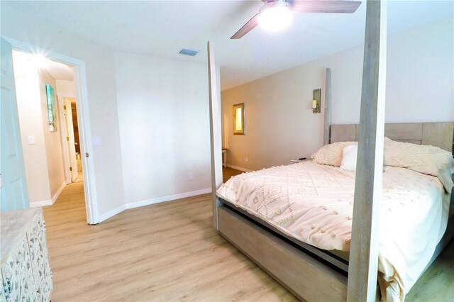 bedroom featuring ceiling fan and light hardwood / wood-style floors