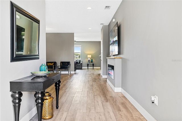 hall featuring hardwood / wood-style flooring