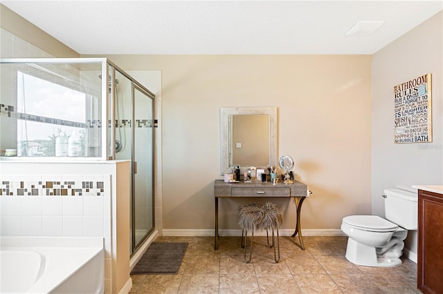 full bathroom featuring tile patterned flooring, separate shower and tub, vanity, and toilet