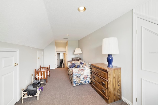 living area with lofted ceiling, recessed lighting, carpet flooring, and a textured ceiling