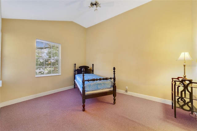 carpeted bedroom with lofted ceiling, ceiling fan, and baseboards